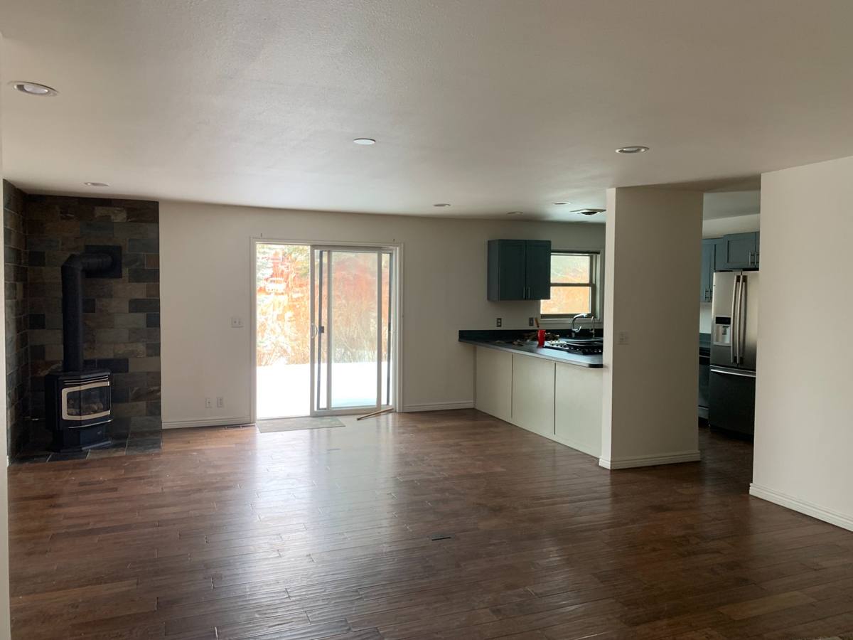 Open concept kitchen before painting Park City Utah renovation