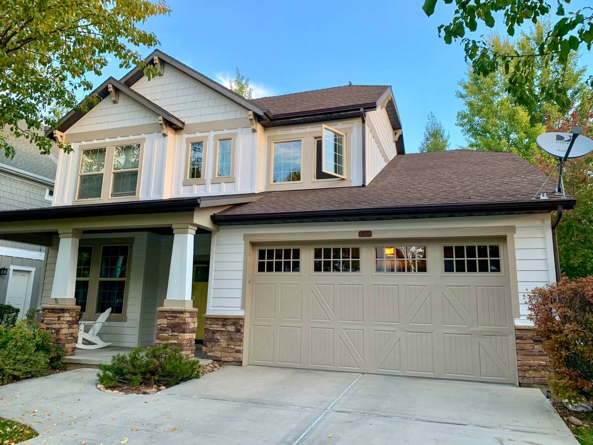 Craftsman home exterior painting Park City Utah beige white trim