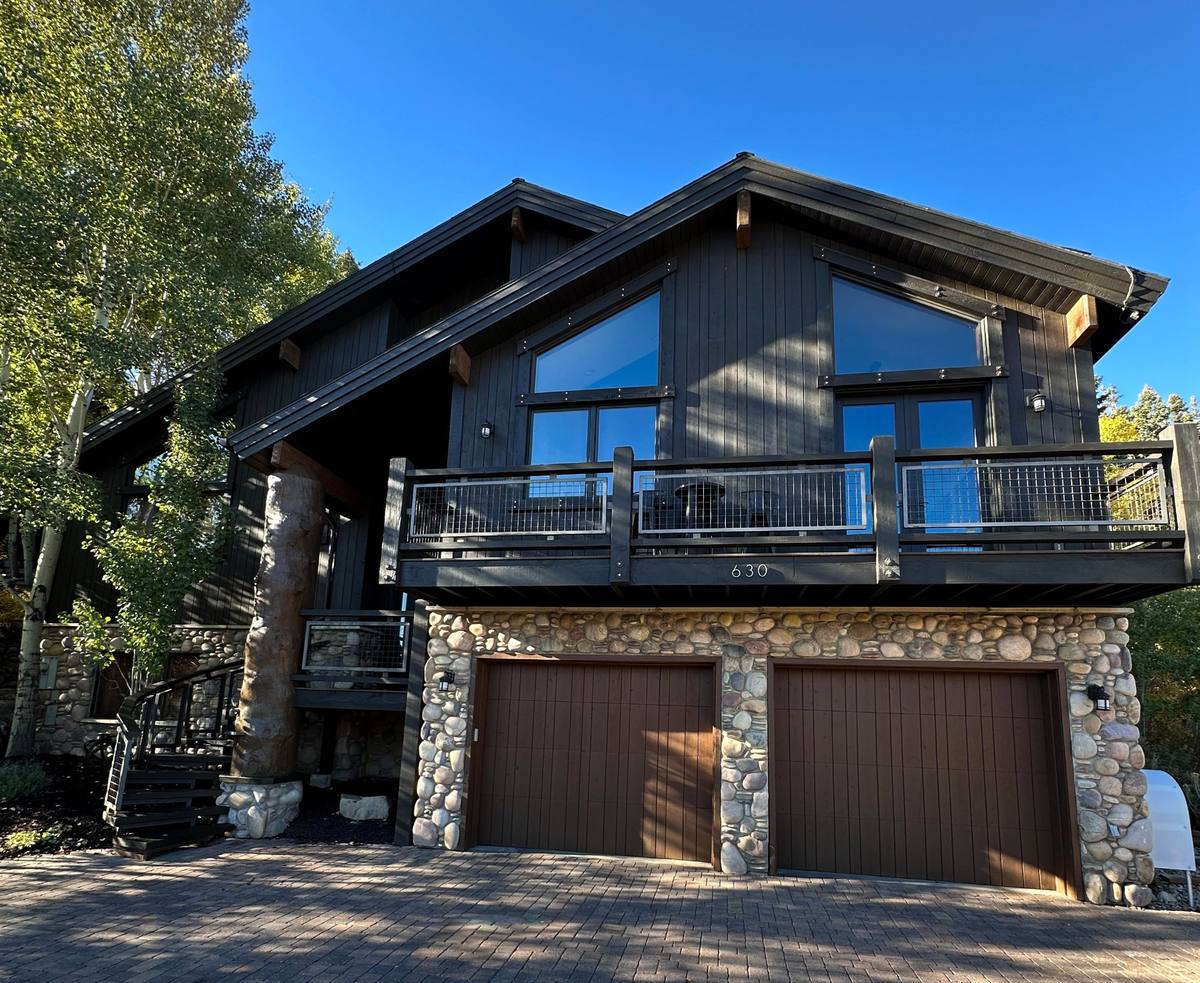 Mountain chalet exterior painting Park City Utah dark siding